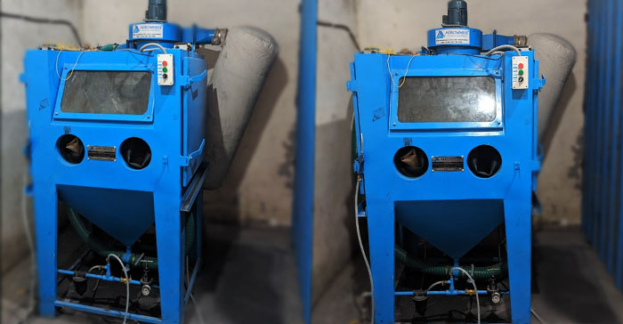 Suction blast cabinet